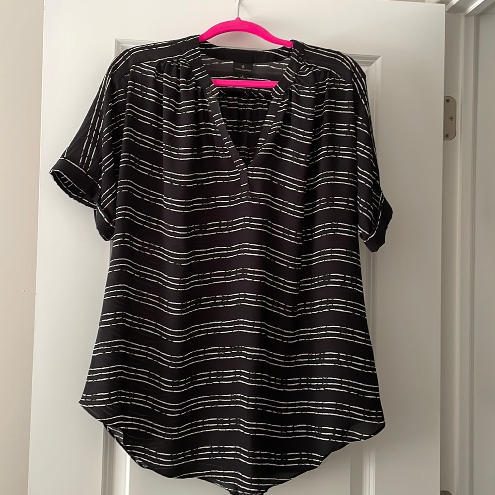 Woman’s short sleeve blouse.